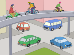 Das Bild zeigt eine Kreuzung. Autos stehen an der Kreuzung. Eine Fahrradbr&uuml;cke f&uuml;hrt &uuml;ber die Kreuzung.