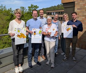 Man sieht eine Gruppe von 7 Personen